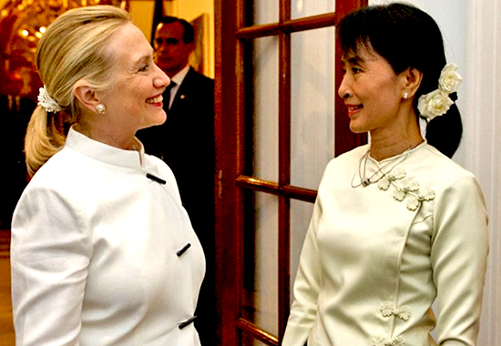 Hillary Clinton and Aung San Suu Kyi, Myanmar democracy icon, talk prior to dinner at the US Chief of Mission Residence in Rangoon, Myanmar.
