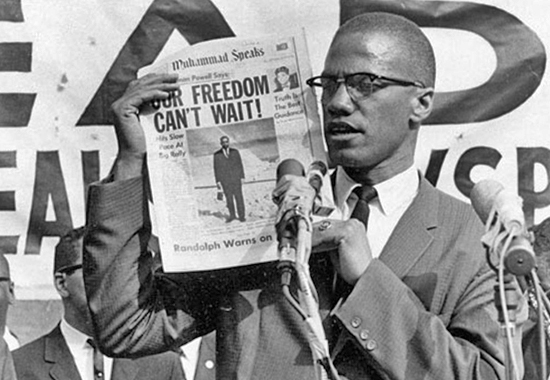 MALCOLM X HERE AT A BLACK MUSLIM RALLY ON AUGUST 6, 1963