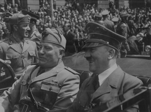 Benito and Adolf enjoying a cruise in their convertible through Munich in 1940